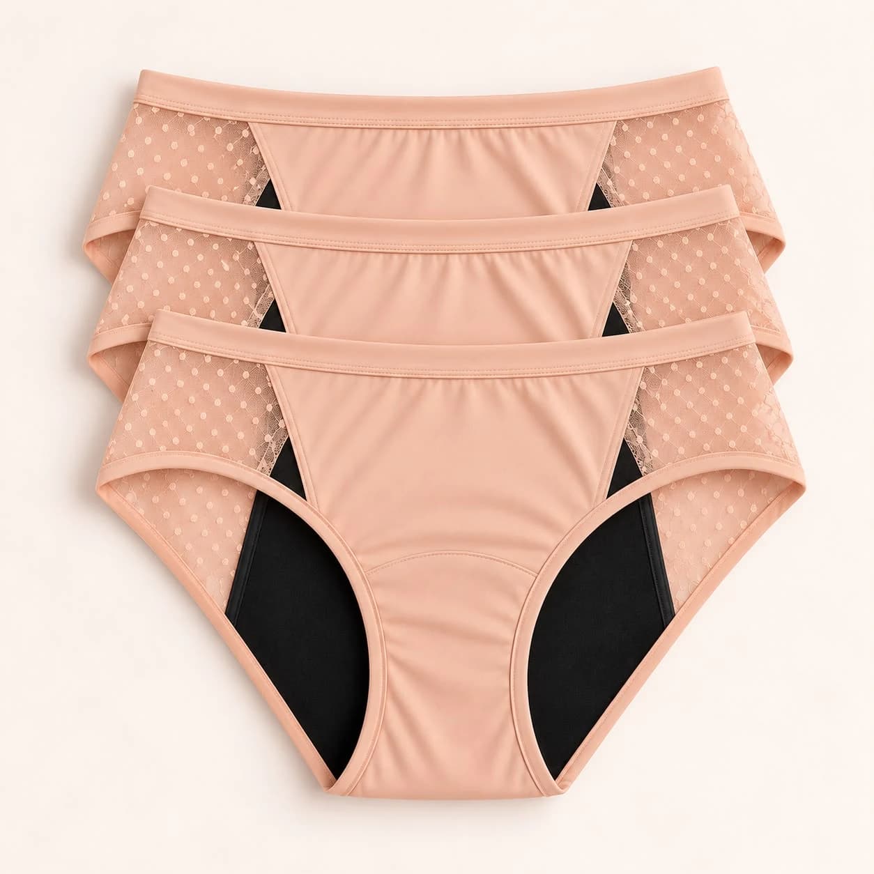 Three pairs of Extra Protection period underwear in Champagne Nude with dotted mesh side panels